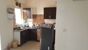 Kitchen in 2 BHK Apartment at Amrapali Zodiac, Sector 120 – for Sale