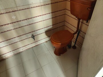 Bathroom in 2 BHK Apartment at Sumangal Heights, Anand Nagar – for Rent