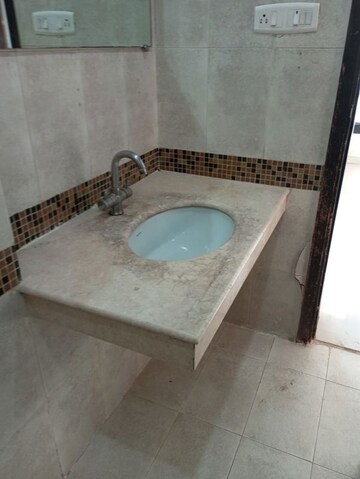 Bathroom in 2.5 BHK Apartment at Oberoi Realty Woods, Goregaon East – for Rent