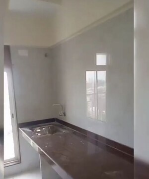 Kitchen in 2 BHK Apartment at Kosmos Kedar Darshan, Borivali West – for Sale