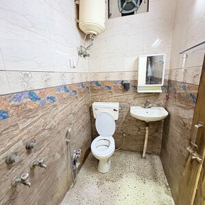 Bathroom in 1 BHK Builder Floor at Khirki Extension – for Rent