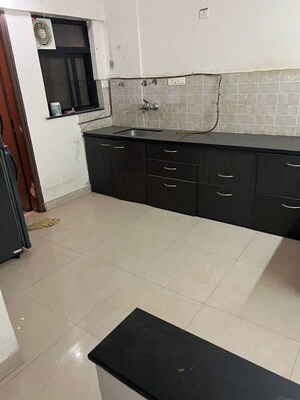 Kitchen in 2 BHK Apartment at Brahma Suncity, Wadgaon Sheri – for Rent