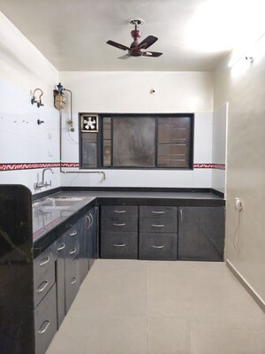 Kitchen in 2 BHK Apartment at Kumar Urban Kruti, Kalyani Nagar – for Rent