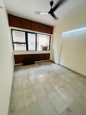 Room in 2 BHK Apartment at Satellite Garden, Goregaon East – for Rent