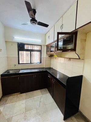Kitchen in 2 BHK Apartment at Satellite Garden, Goregaon East – for Rent