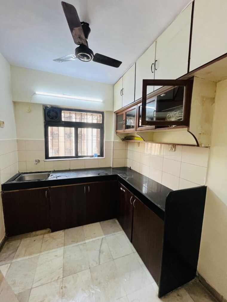 Kitchen, satellite-garden 2 Bedroom 875 Sq.Ft. Apartment In Goregaon East Mumbai 9863745