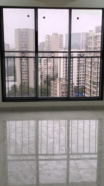 Room in 2 BHK Apartment at Pratham ARC Aura, Andheri West – for Rent