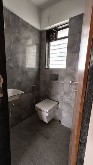 Bathroom in 2 BHK Apartment at Pratham ARC Aura, Andheri West – for Rent