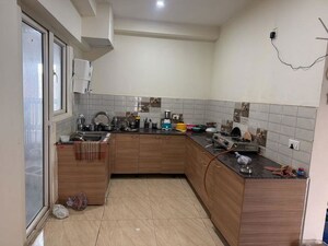 Kitchen in 3 BHK Apartment at Gaur Yamuna City 16th Park View, Gaur Yamuna City – for Sale