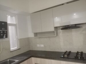 Kitchen in 3 BHK Builder Floor at Smart World Orchard, Sector 61 – for Rent