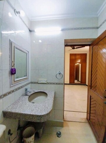 Bathroom in 2 BHK Apartment at Vasant Kunj – for Rent