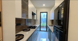 Kitchen in 3 BHK Apartment at Signature Global Daxin Vistas, Bhondsi – for Sale