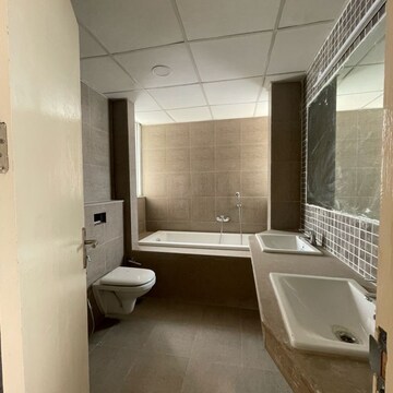 Bathroom in 4 BHK Apartment at Conscient Heritage Max, Sector 102 – for Rent