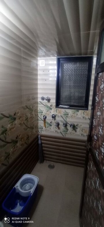 Bathroom in 1 BHK Apartment at Jai Shree Ganesh CHS, Dombivli West – for Rent