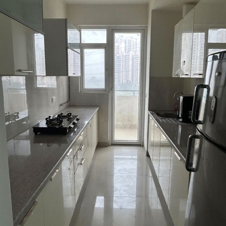 Kitchen, emaar-imperial-gardens 3 Bedroom 2025 Sq.Ft. Apartment In Sector 102 Gurgaon 9864330