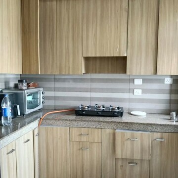 Kitchen in 4 BHK Apartment at Paras Dews, Panwala Khusropur – for Rent