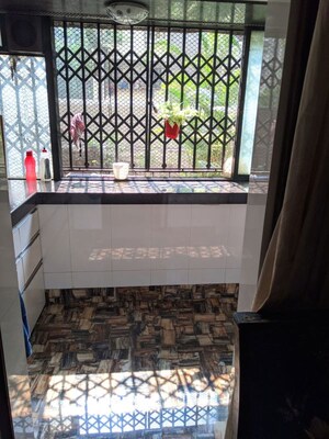 Kitchen in 2 BHK Apartment at Jumbo Darshan, Andheri East – for Rent