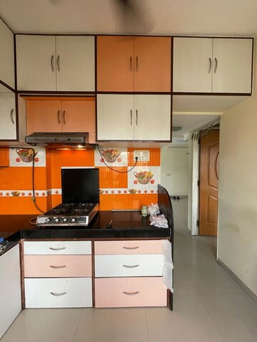Kitchen in 2 BHK Apartment at Nivara Deepanjali CHSL, Vile Parle East – for Rent