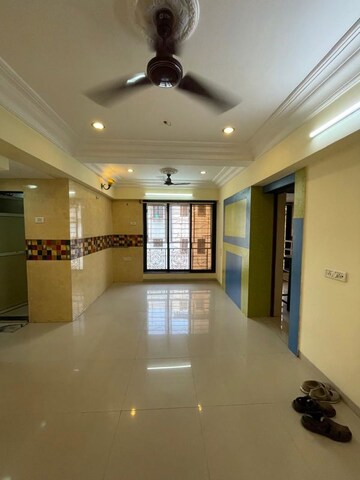 Living Room in 2 BHK Apartment at Nivara Deepanjali CHSL, Vile Parle East – for Rent