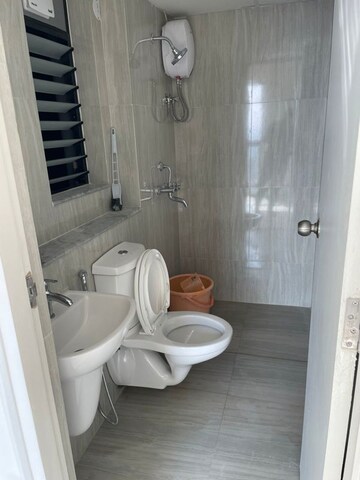 Bathroom in 1.5 BHK Apartment at Runwal Gardens, Dombivli East – for Rent