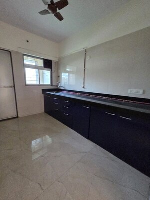 Kitchen in 2 BHK Apartment at Cosmos Habitat, Majiwada – for Rent