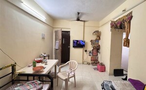 Living Room in 1 BHK Apartment at Kshitij CHS, Goregaon East – for Sale