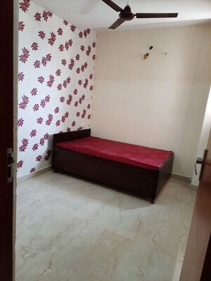 Bedroom in 3.5 BHK Builder Floor at Dhakoli – for Sale