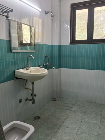 Bathroom in 3 BHK Builder Floor at Ansal Plaza Sector-23, Sector 23 – for Rent