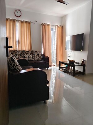 Living Room in Studio Apartment at Puravankara Silversands, Mundhwa – for Rent