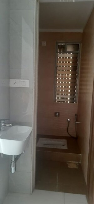 Bathroom in 1 BHK Apartment at Oxyfresh Homes, Rohinjan – for Sale