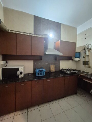 Kitchen in 3 BHK Builder Floor at Ansal Sushant Apartments, Sushant Lok I – for Rent