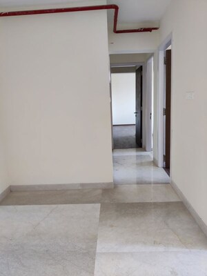 Building Lobby in 2.5 BHK Apartment at Bhimjyani Verraton, Manpada – for Sale