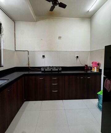 Kitchen in 1 BHK Apartment at Lodha Splendora, Ghodbunder Road – for Sale