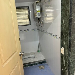 Bathroom in 2 BHK Apartment at Suncity Souvenir, Jamil Nagar – for Rent