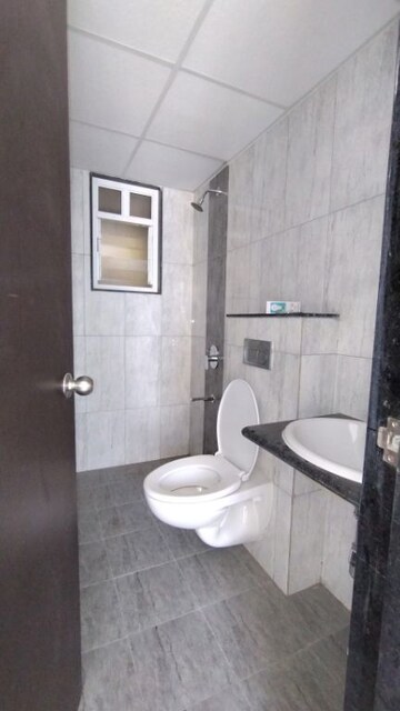 Bathroom in 2 BHK Apartment at Kolte Patil R10, Hinjewadi – for Rent
