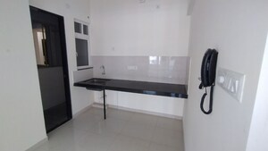 Kitchen in 2 BHK Apartment at Kolte Patil R10, Hinjewadi – for Rent