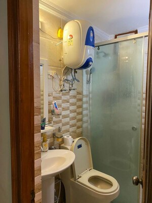 Bathroom in 3 BHK Apartment at Sector 7 Dwarka – for Rent