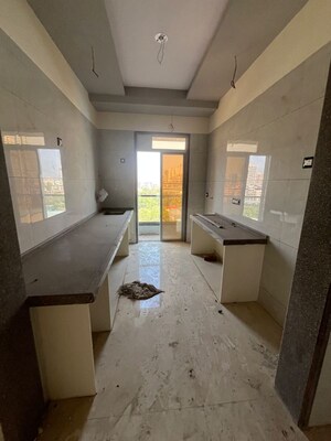 Kitchen in 2 BHK Apartment at Mangeshi Tulip, Wayle Nagar – for Sale