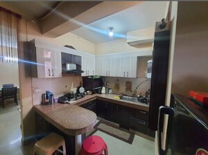 Kitchen in 2 BHK Apartment at SRS Royal Hills, Sector 87 – for Sale