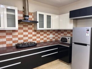 Kitchen in 1 RK Apartment at Ardee City Palm Grove Heights, Sector 52 – for Rent