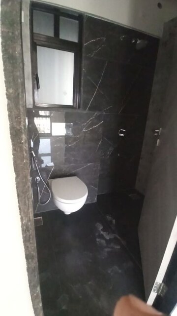 Bathroom in 1 BHK Apartment at Ajmera Boulevard, Malad West – for Rent