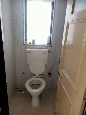 Bathroom in 2 BHK Apartment at Ahimsa Niketan CHS, Malad West – for Rent