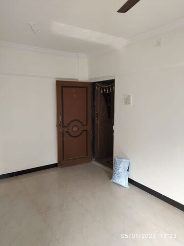 Room in 2 BHK Apartment at Ahimsa Niketan CHS, Malad West – for Rent