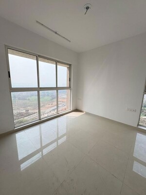 Room in 1 BHK Apartment at Lodha Codename Premier, Mangaon – for Sale