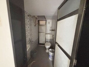 Bathroom in 2 BHK Apartment at Vardhman Gardens, Balkum Pada – for Sale