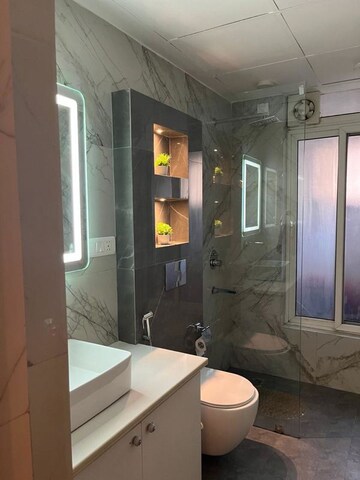 Bathroom in 3 BHK Apartment at Mahindra Aura Phase III, Sector 110a – for Rent
