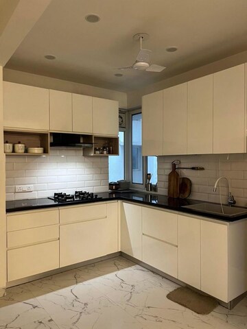 Kitchen in 3 BHK Apartment at Mahindra Aura Phase III, Sector 110a – for Rent