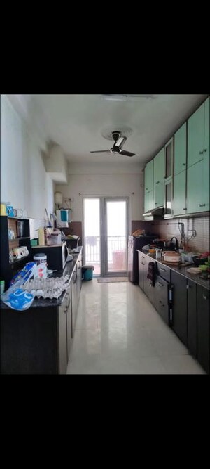 Kitchen in 3 BHK Apartment at Antriksh Golf View, Sector 78 – for Rent