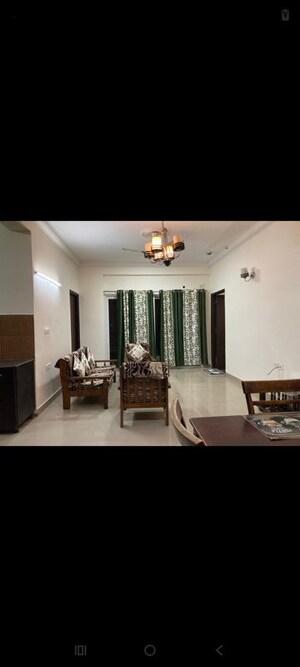 Living Room in 3 BHK Apartment at Antriksh Golf View, Sector 78 – for Rent
