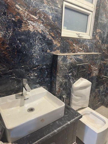 Bathroom in 3 BHK Builder Floor at Ansal API Esencia, Sector 67 – for Rent